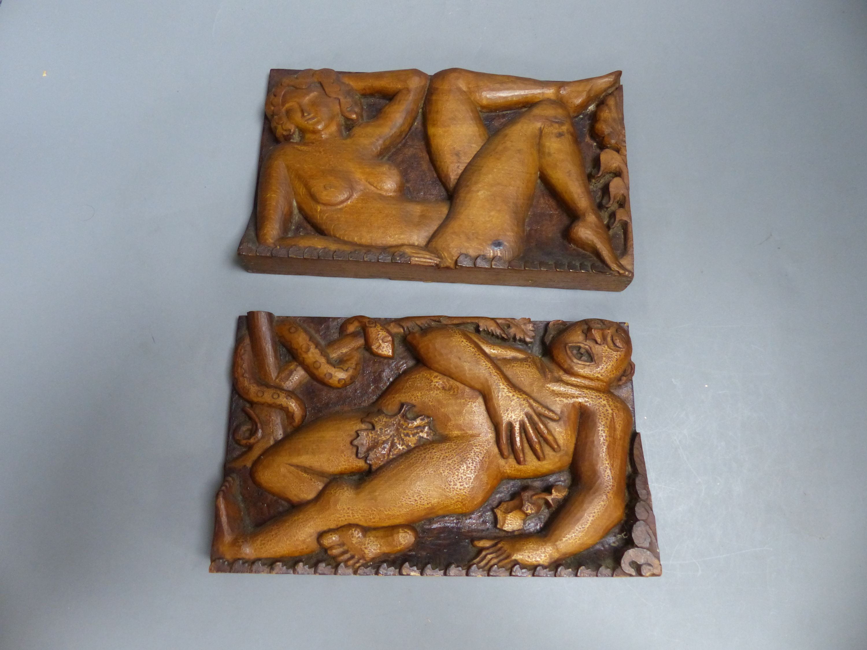 R.H. Harris, two carved wood panels, Adam and Eve, signed and dated 1939, 15 x 25cm